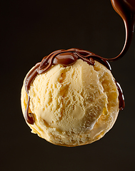 Image showing vanilla ice cream with melted chocolate