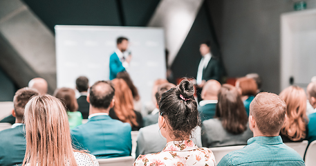 Image showing Pitch presentation and project discussion at business convention or team meeting. Audience at the conference hall. Business and entrepreneurship symposium.