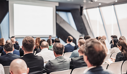 Image showing Round table discussion at business conference meeting event.. Audience at the conference hall. Business and entrepreneurship symposium.