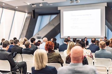 Image showing Round table discussion at business conference meeting event.. Audience at the conference hall. Business and entrepreneurship symposium.