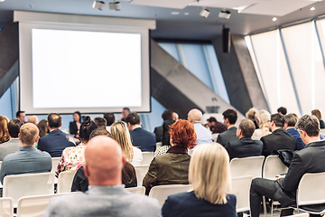 Image showing Round table discussion at business conference meeting event.. Audience at the conference hall. Business and entrepreneurship symposium.