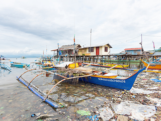 Image showing Filipino fishing boat in a sea of junk