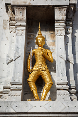 Image showing Gold guard on tower, Wat Phi, Thailand