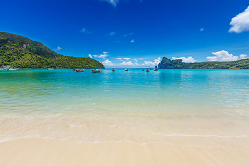 Image showing Long tail boats in bay. Thailand