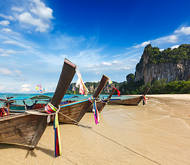 Image showing Long tail boats on beach, Thailand