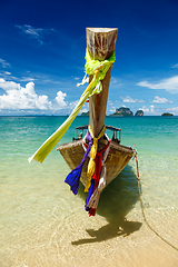 Image showing Long tail boat on beach, Thailand