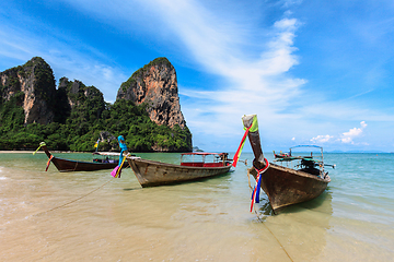 Image showing Long tail boats on beach, Thailand