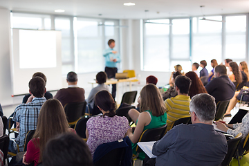 Image showing Speaker giving presentation on business conference.