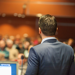 Image showing Public speaker giving talk at Business Event.