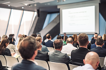 Image showing Round table discussion at business conference meeting event.. Audience at the conference hall. Business and entrepreneurship symposium.