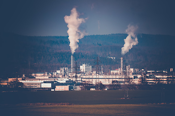 Image showing industrial cityscape with with smoking factory