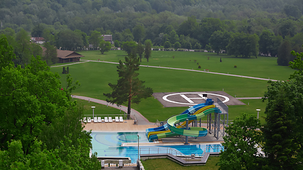 Image showing swimming pool on luxury resort in forest.