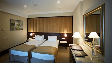 Image showing Two beds in a hotel room. Interior design