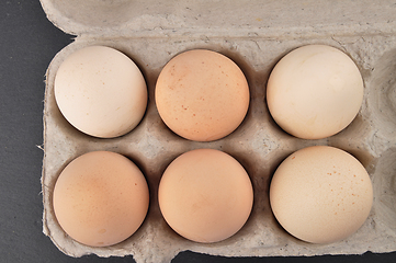 Image showing Organic eggs in cardboard