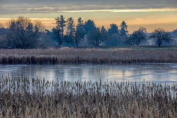 Image showing rural landscape with frozen small pond