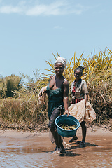 Image showing Native Malagasy fishermen woman fishing on river, Madagascar