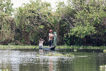 Image showing Native Malagasy fishermen fishing on river, Madagascar