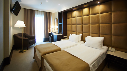 Image showing Two beds in a hotel room. Interior design
