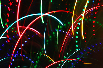 Image showing Abstract colorful motion background with blurred lights