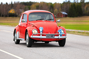 Image showing 1970 Red Volksvagen Beetle Car on Road