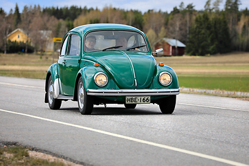 Image showing Green 1973 Volkswagen Beetle 1300 Car on Road