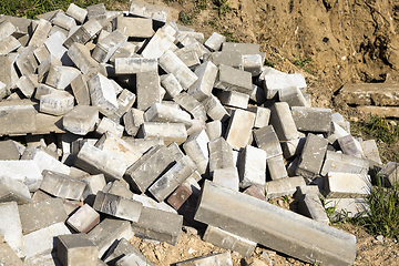 Image showing pile of old concrete paving slabs