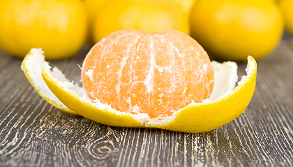 Image showing peeled orange juicy tangerine