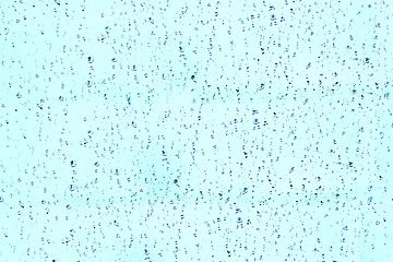 Image showing droplets of water on the glass