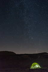 Image showing Tent under stars in desert vacation