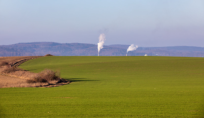 Image showing Smoke emission from factory pipes