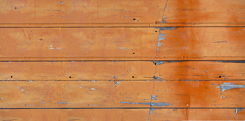 Image showing Old wood board painted orange. Banner background