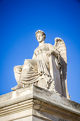 Image showing History statue near the Triumphal Arch of the Carrousel, Paris, 