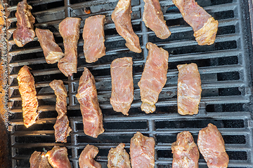 Image showing yummy steak on the grill for dinner