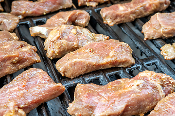 Image showing yummy steak on the grill for dinner