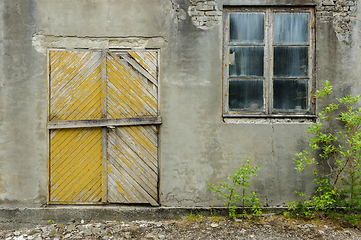 Image showing old brick wall with door and window