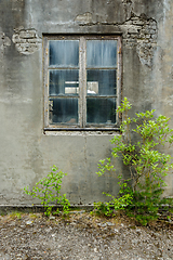 Image showing old window in dilapidated brick wall