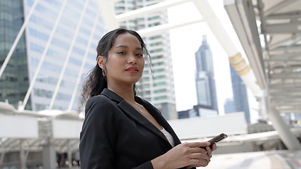 Image showing Young Businesswoman Enjoying City Life in Bangkok.