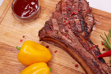Image showing The Barbecue Tomahawk Steak on Cutting Board