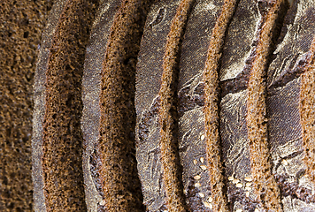 Image showing black rye bread cut