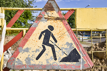 Image showing Old yellow temporary road sign