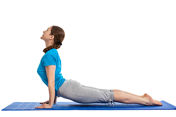 Image showing Yoga - young beautiful woman doing yoga asana excerise isolated