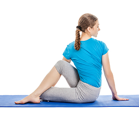 Image showing Yoga - young beautiful woman doing yoga asana excerise isolated