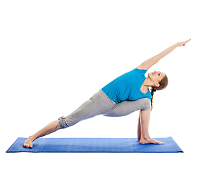 Image showing Yoga - young beautiful woman doing yoga asana excerise isolated