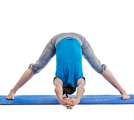 Image showing Yoga - young beautiful woman doing yoga asana excerise isolated