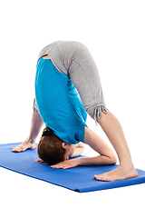 Image showing Yoga - young beautiful woman doing yoga asana excerise isolated