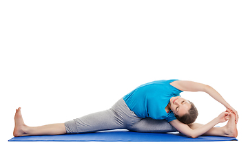 Image showing Yoga - young beautiful woman doing yoga asana excerise isolated