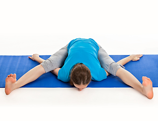 Image showing Yoga - young beautiful woman doing yoga asana excerise isolated