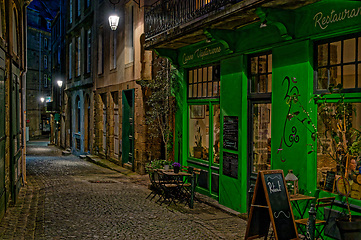 Image showing Restaurant on the street with lanterns in an old medieval french walled city