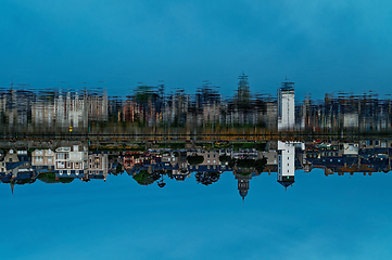 Image showing Original inverted photo with the reflection of the ancient city in the water