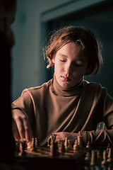 Image showing Teenager playing chess